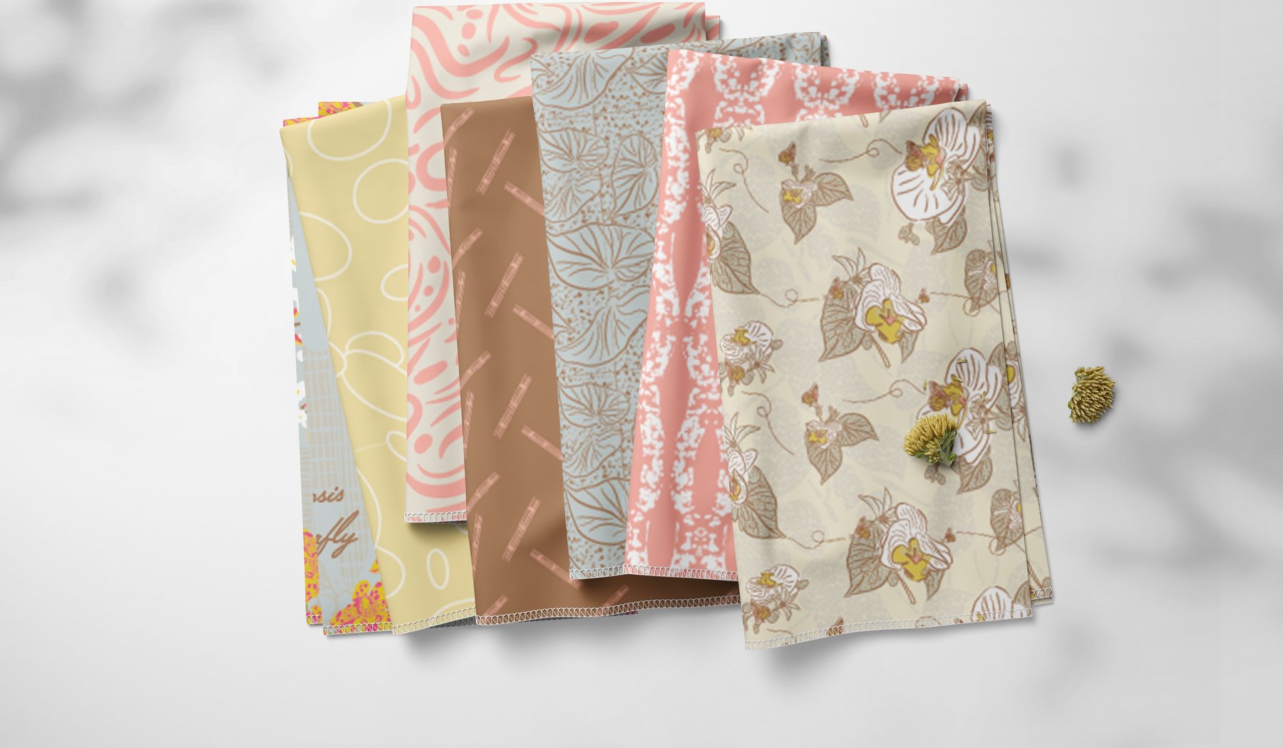 Orchid Collection patterns on folded fabric swatches